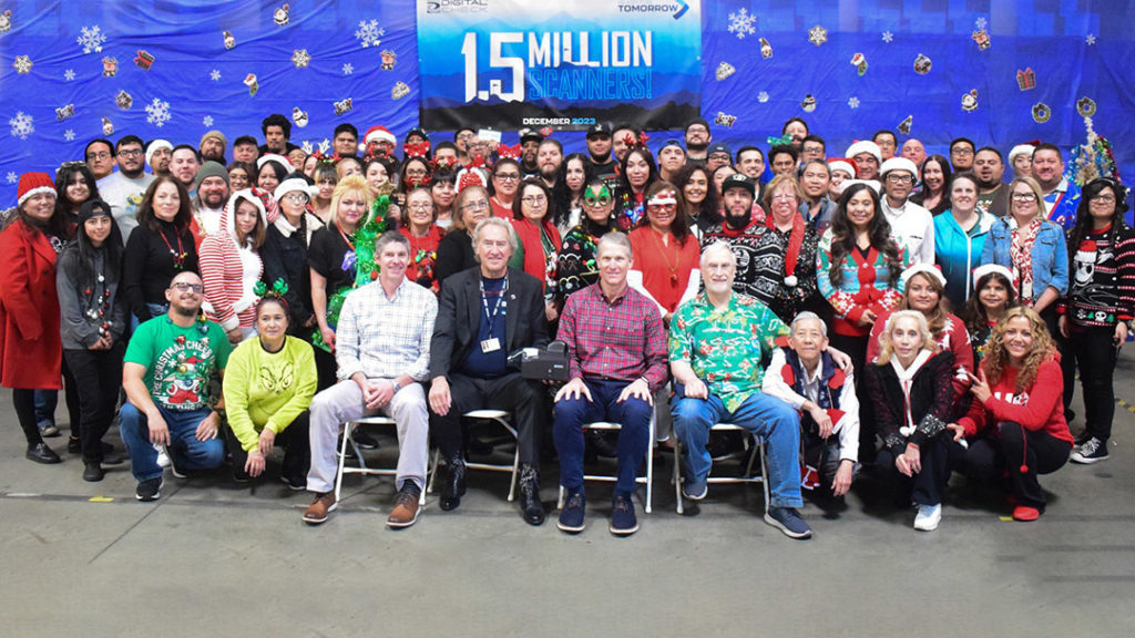 1.5 million scanners factory group photo.